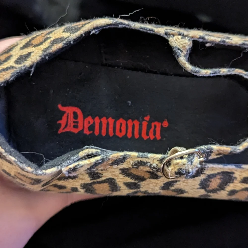 Demonia Studded Cheetah Print Platform Shoes